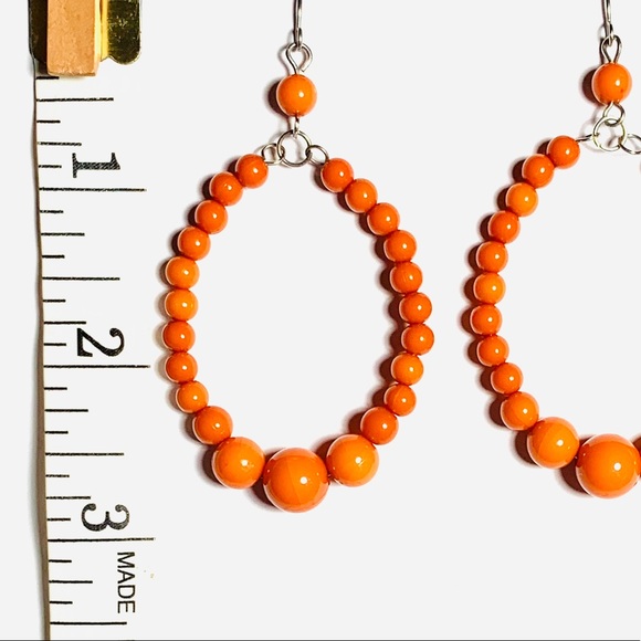 Orange beaded oval earrings - Picture 2 of 2
